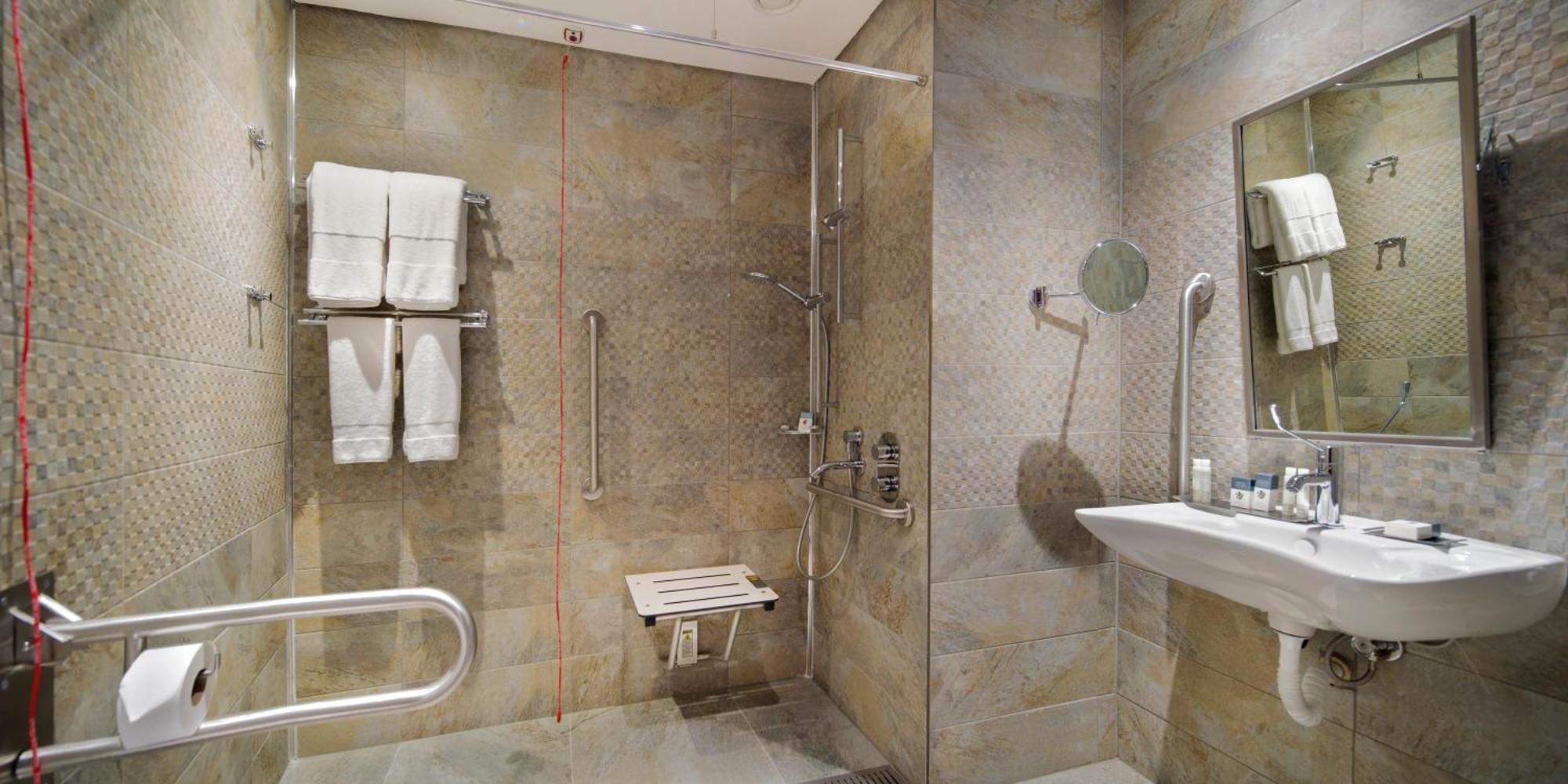 Doubletree By Hilton Istanbul - Piyalepasa Ξενοδοχείο Εξωτερικό φωτογραφία A shower seat